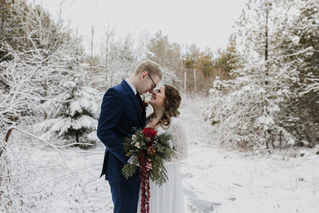 bride and groom at their winter micro wedding in port hope ontario
